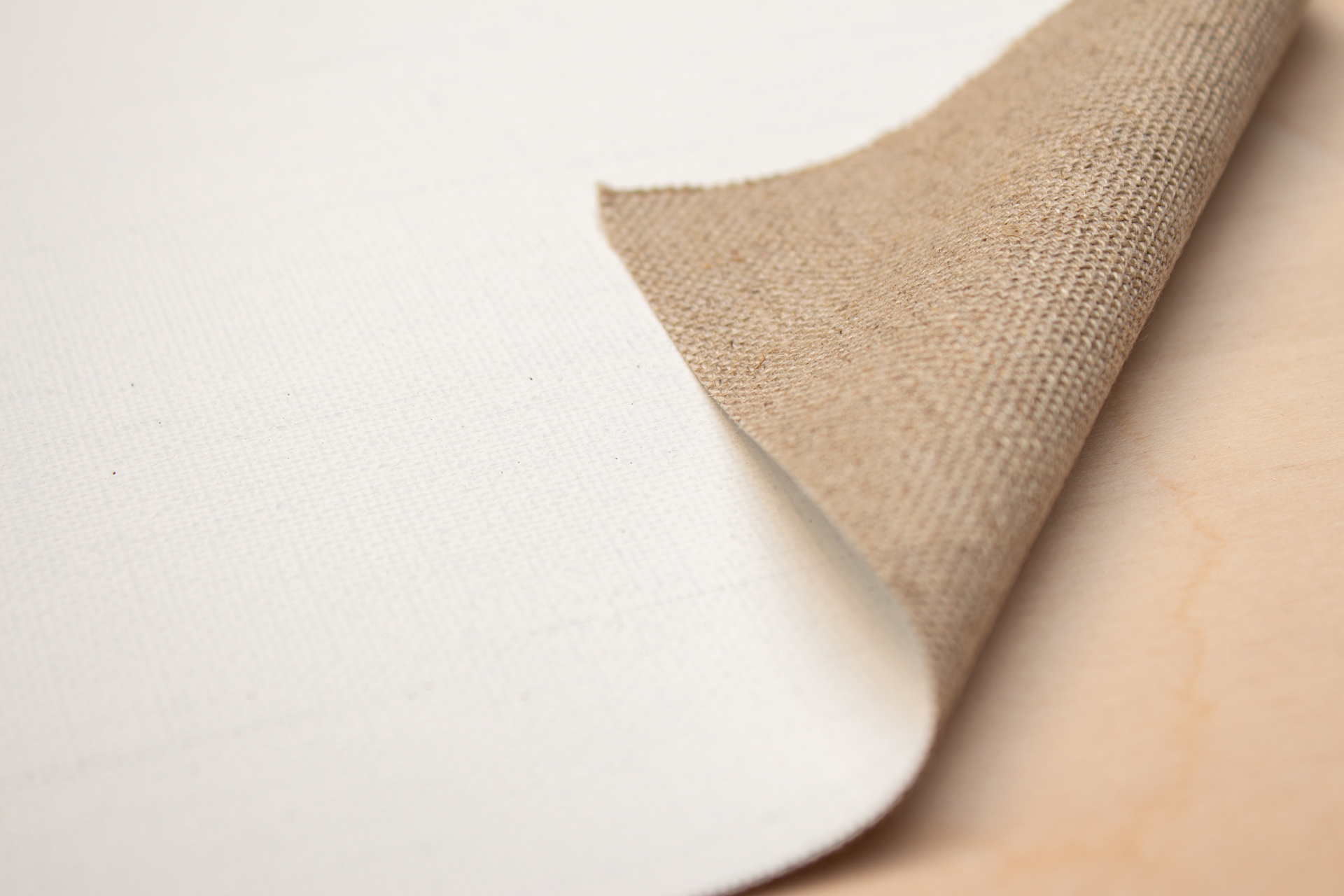 10733_2 Caravaggio 512 primed linen 400 g/m² white, 2.10 m width, medium- fine